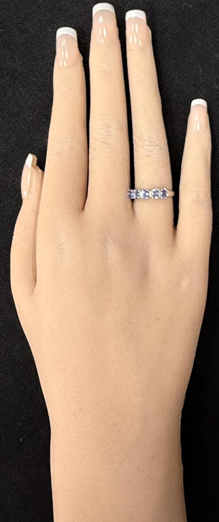 18K White Gold Oval Cut Tanzanite and Diamond Accent Step Up Band Ring