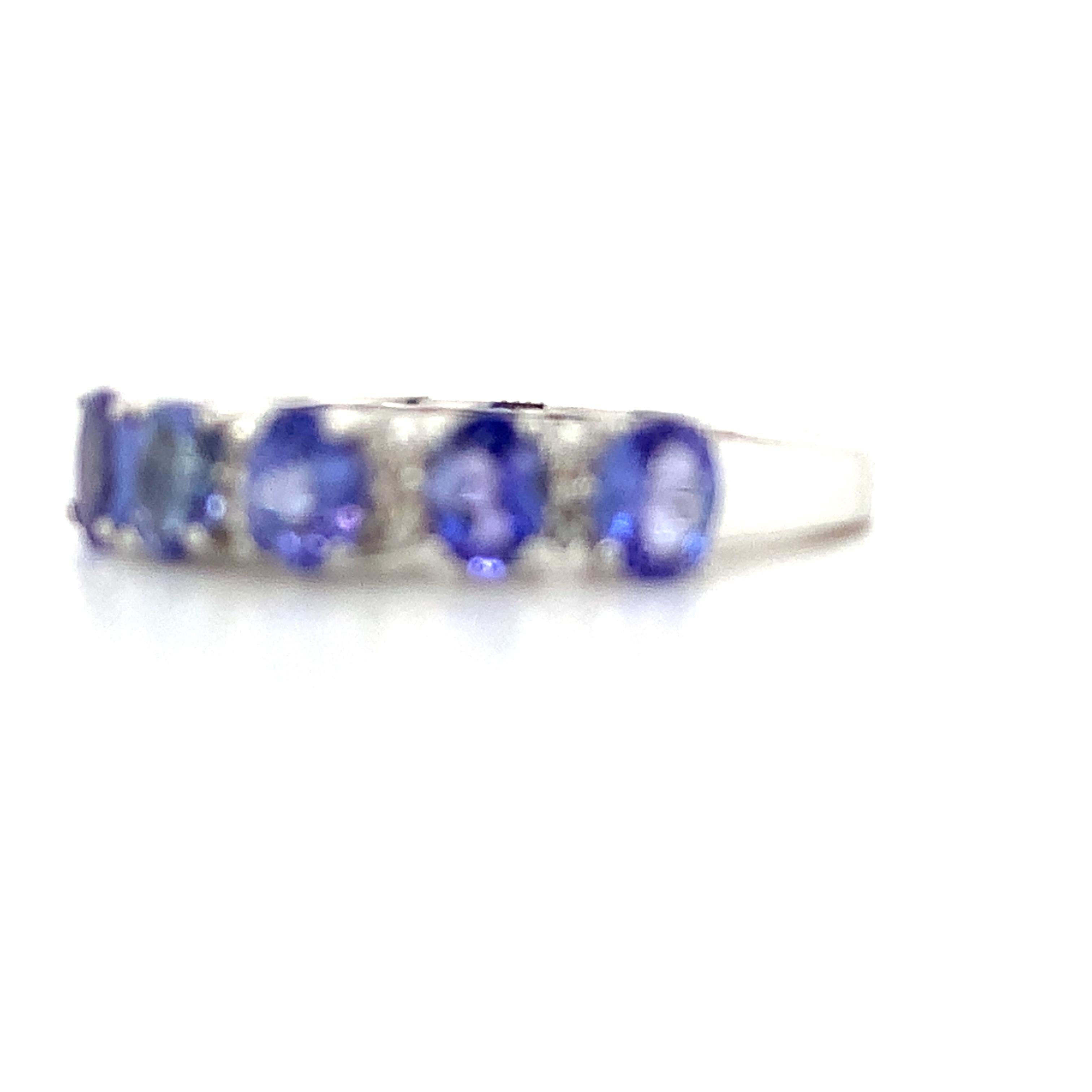 18K White Gold Oval Cut Tanzanite and Diamond Accent Step Up Band Ring