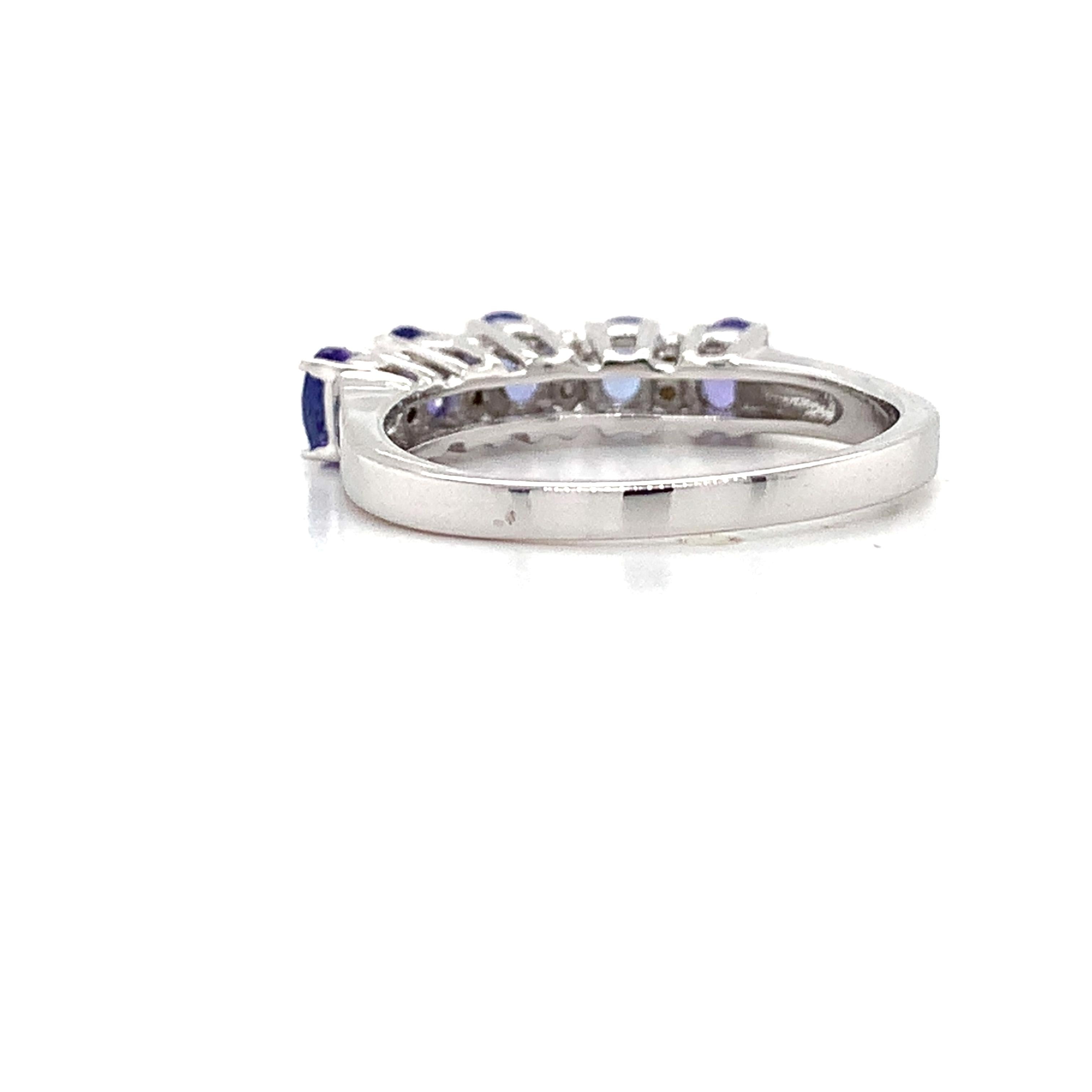 18K White Gold Oval Cut Tanzanite and Diamond Accent Step Up Band Ring