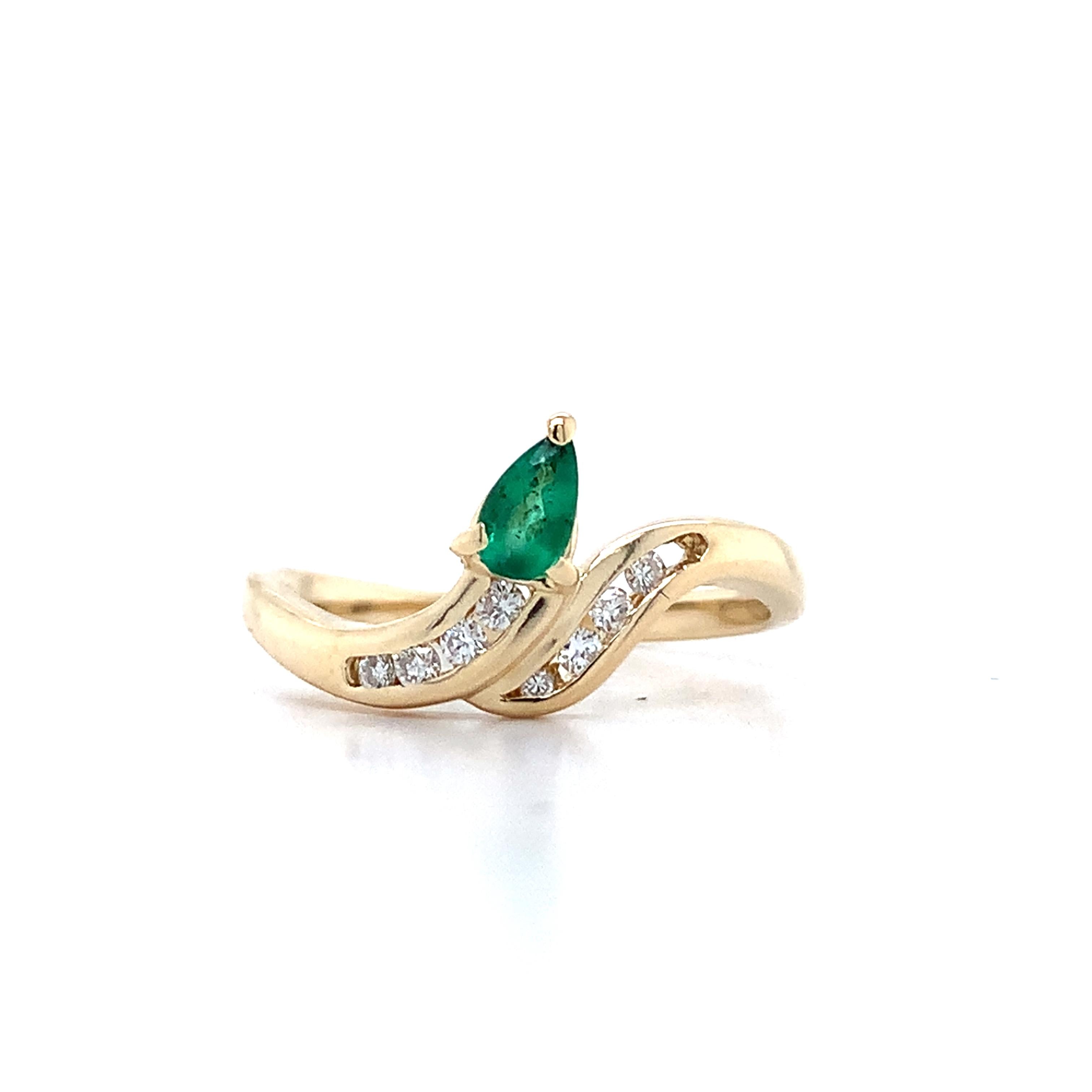 14K Yellow Gold Pear Cut Emerald With Channel Set Accent Diamond Bypass Ring