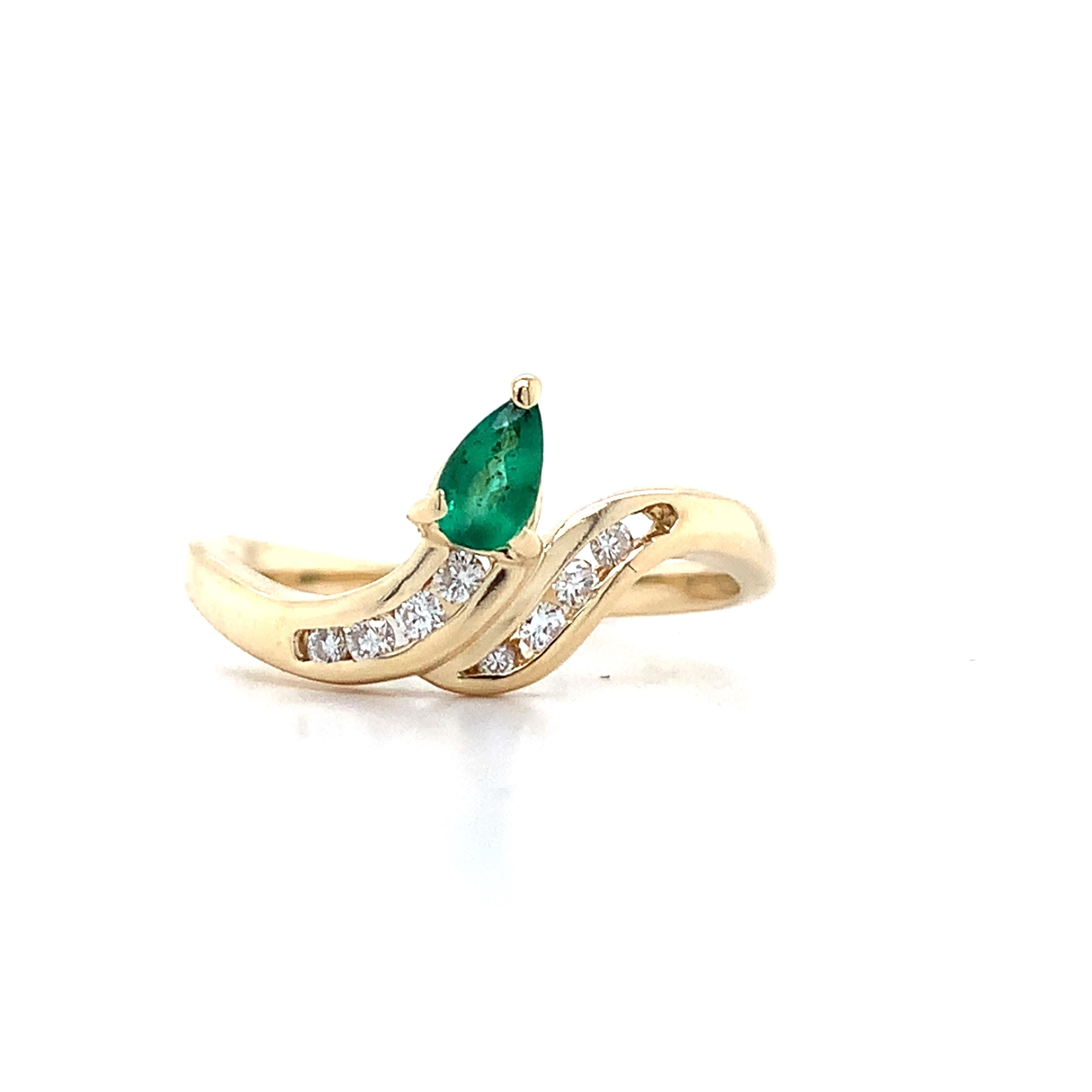 14K Yellow Gold Pear Cut Emerald With Channel Set Accent Diamond Bypass Ring
