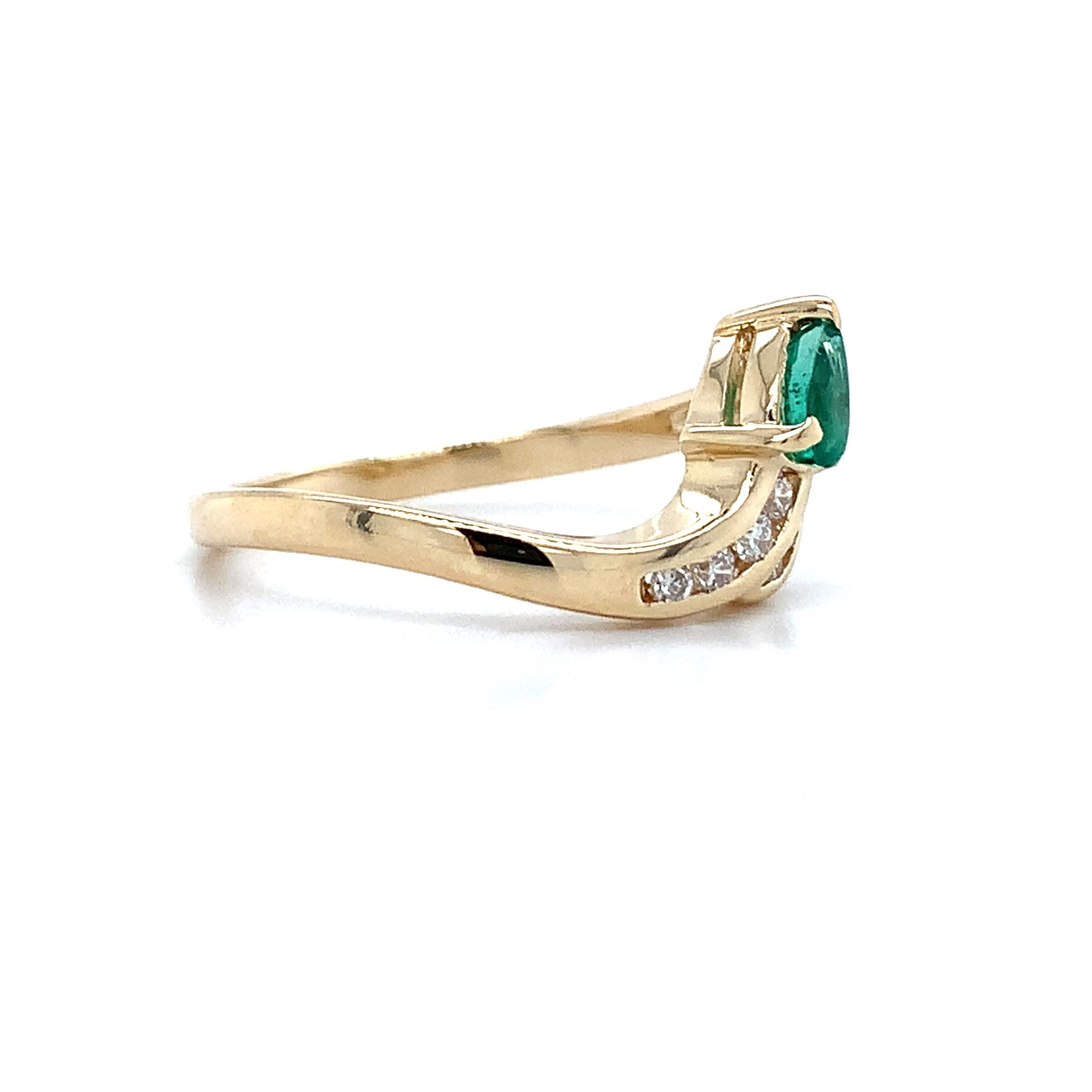 14K Yellow Gold Pear Cut Emerald With Channel Set Accent Diamond Bypass Ring