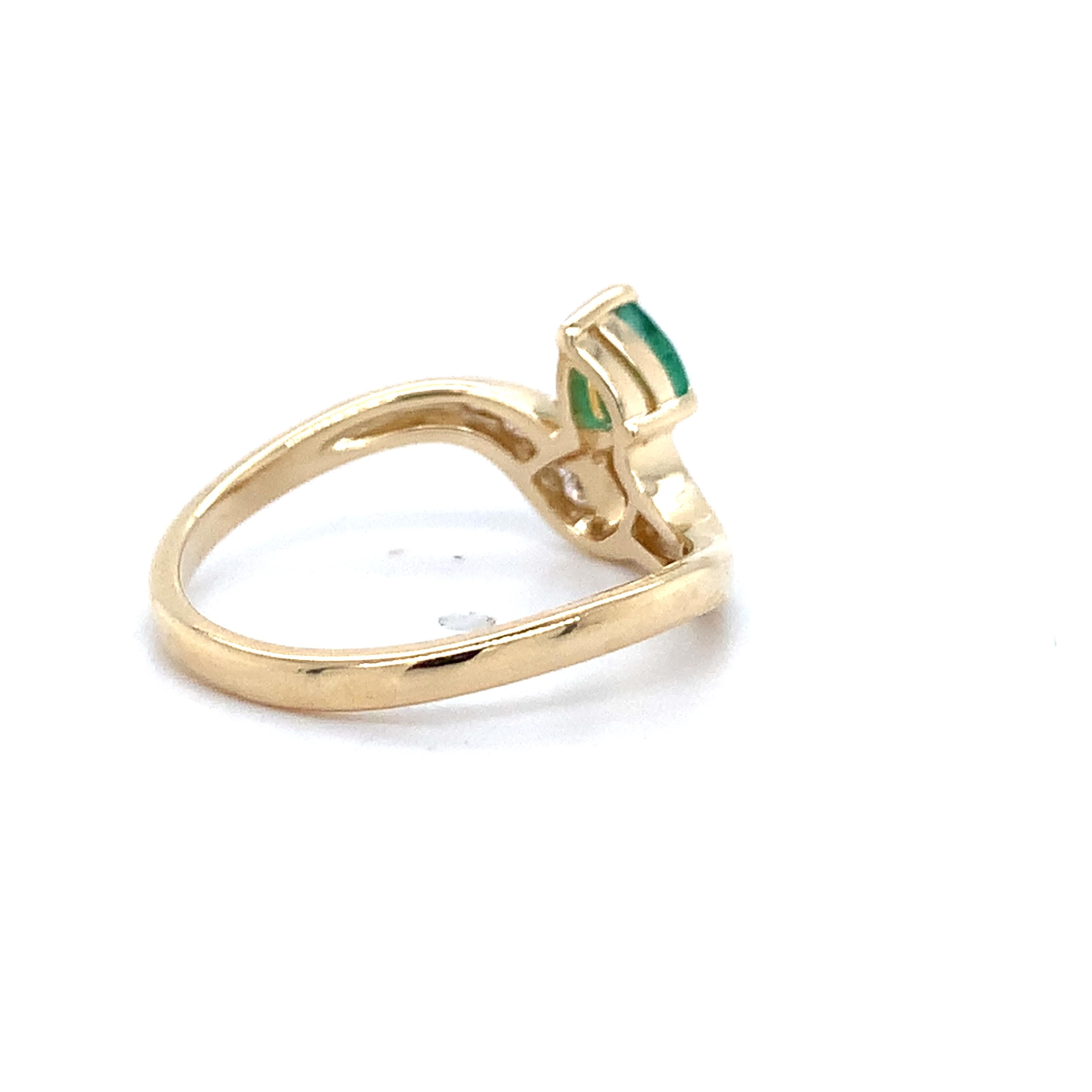 14K Yellow Gold Pear Cut Emerald With Channel Set Accent Diamond Bypass Ring