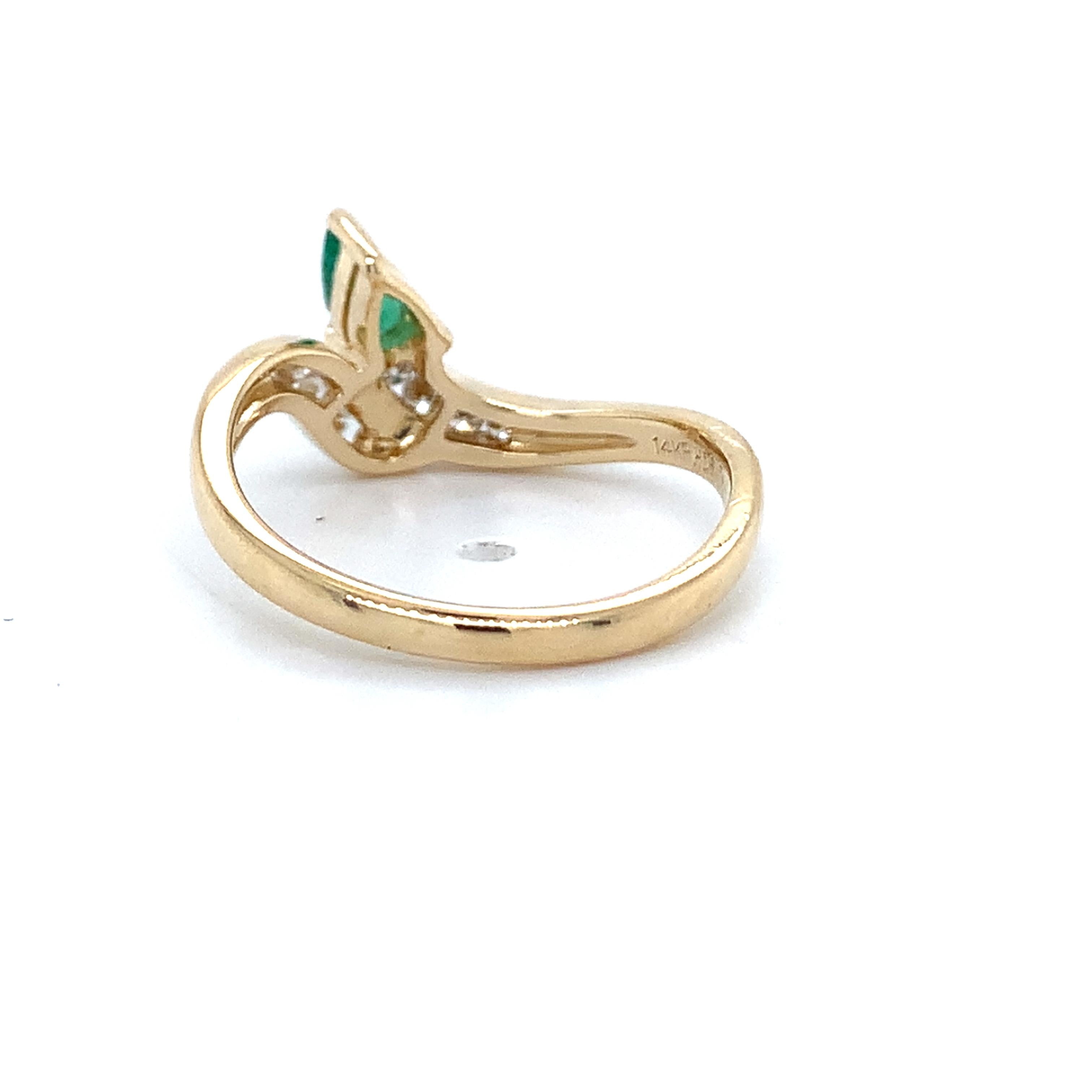 14K Yellow Gold Pear Cut Emerald With Channel Set Accent Diamond Bypass Ring