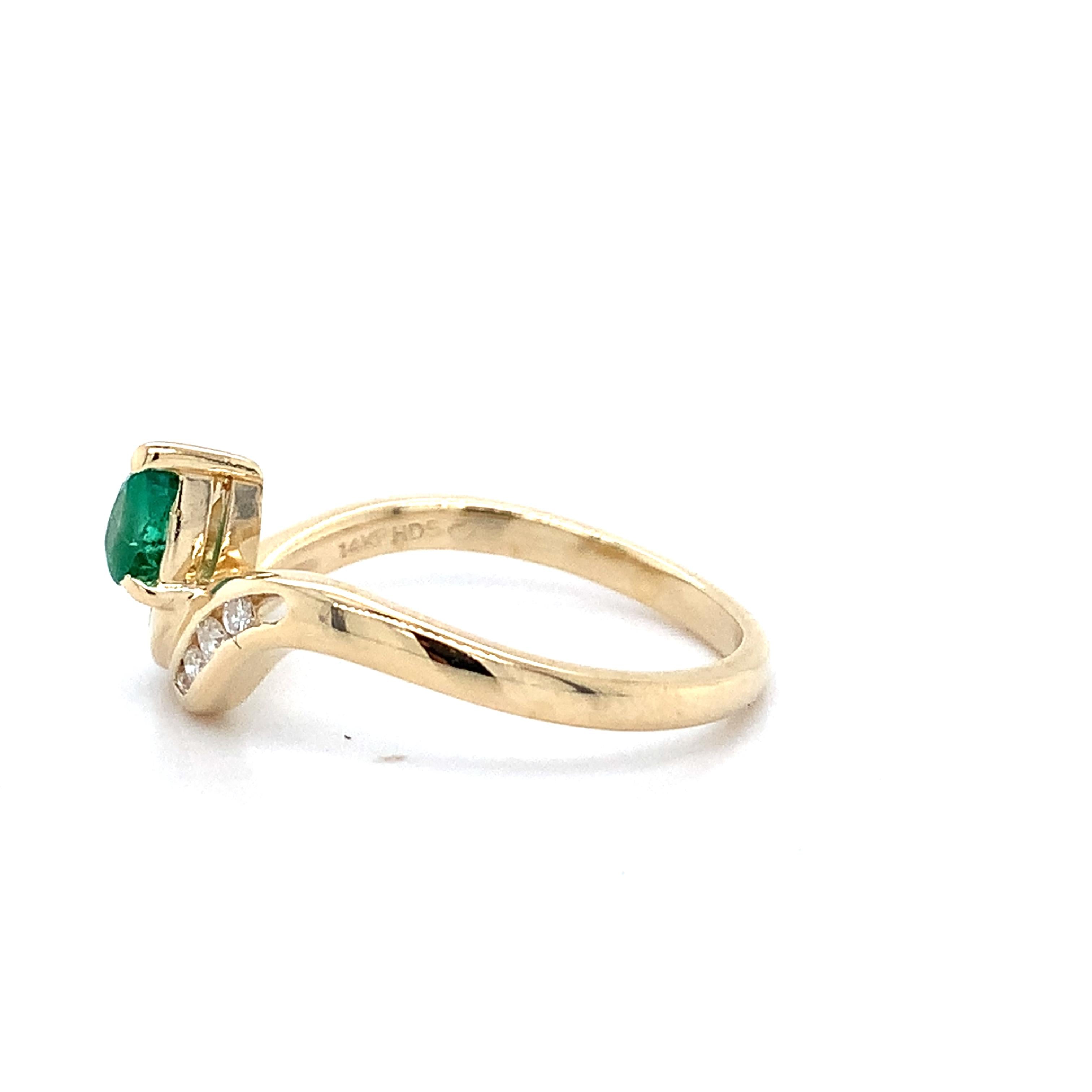 14K Yellow Gold Pear Cut Emerald With Channel Set Accent Diamond Bypass Ring