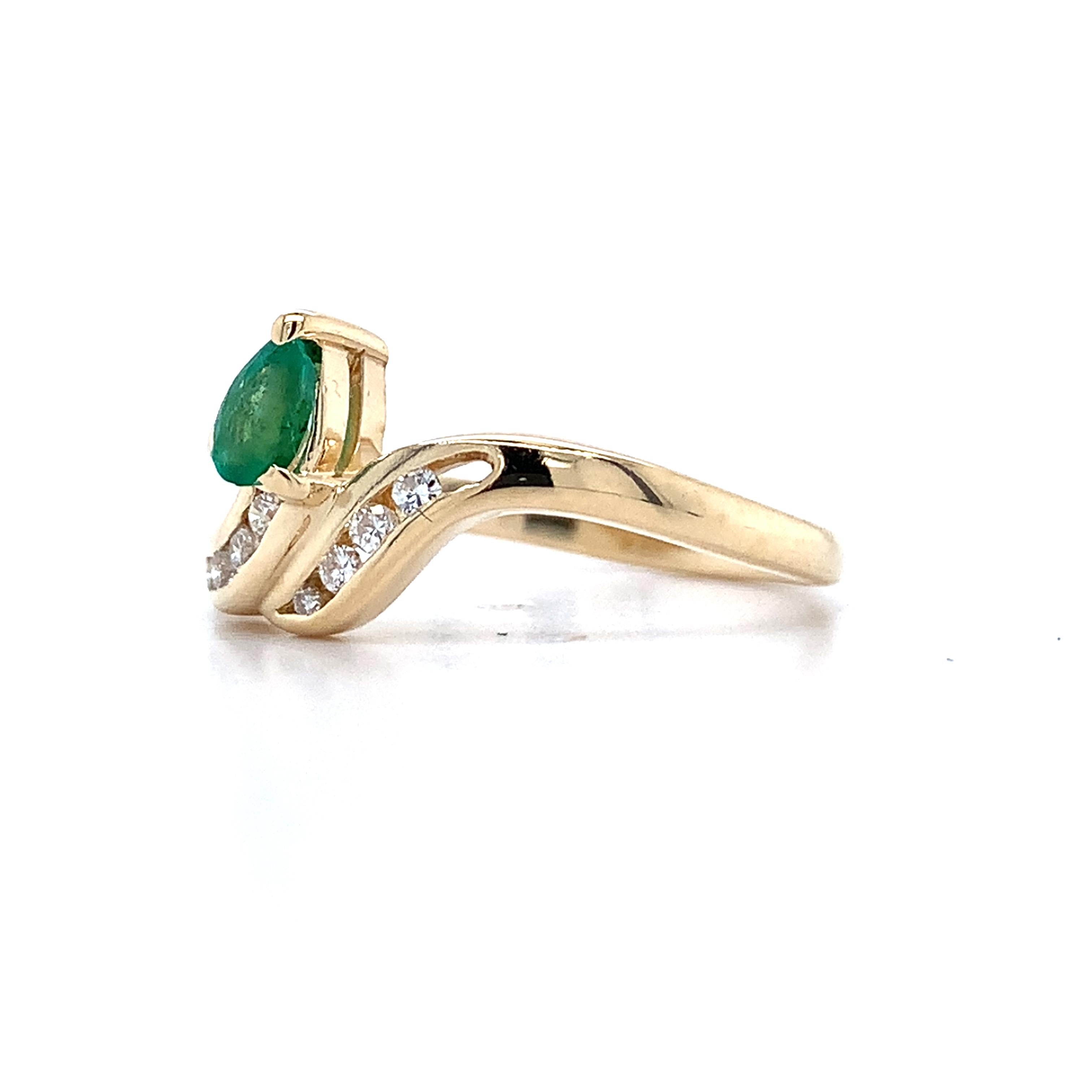14K Yellow Gold Pear Cut Emerald With Channel Set Accent Diamond Bypass Ring