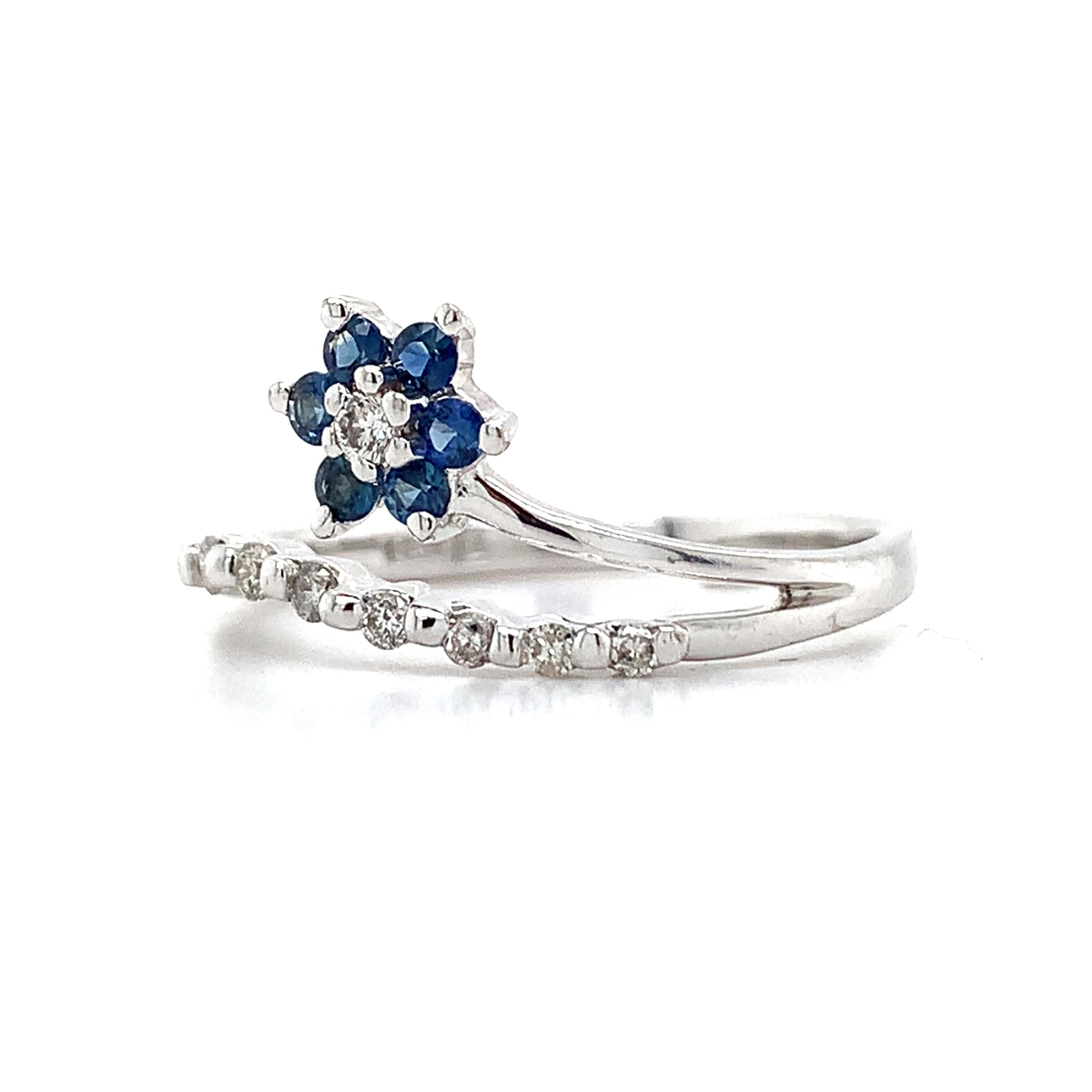 14K White Gold Blue Sapphire And .1ct Round Diamond Split Shank Flower Band Ring