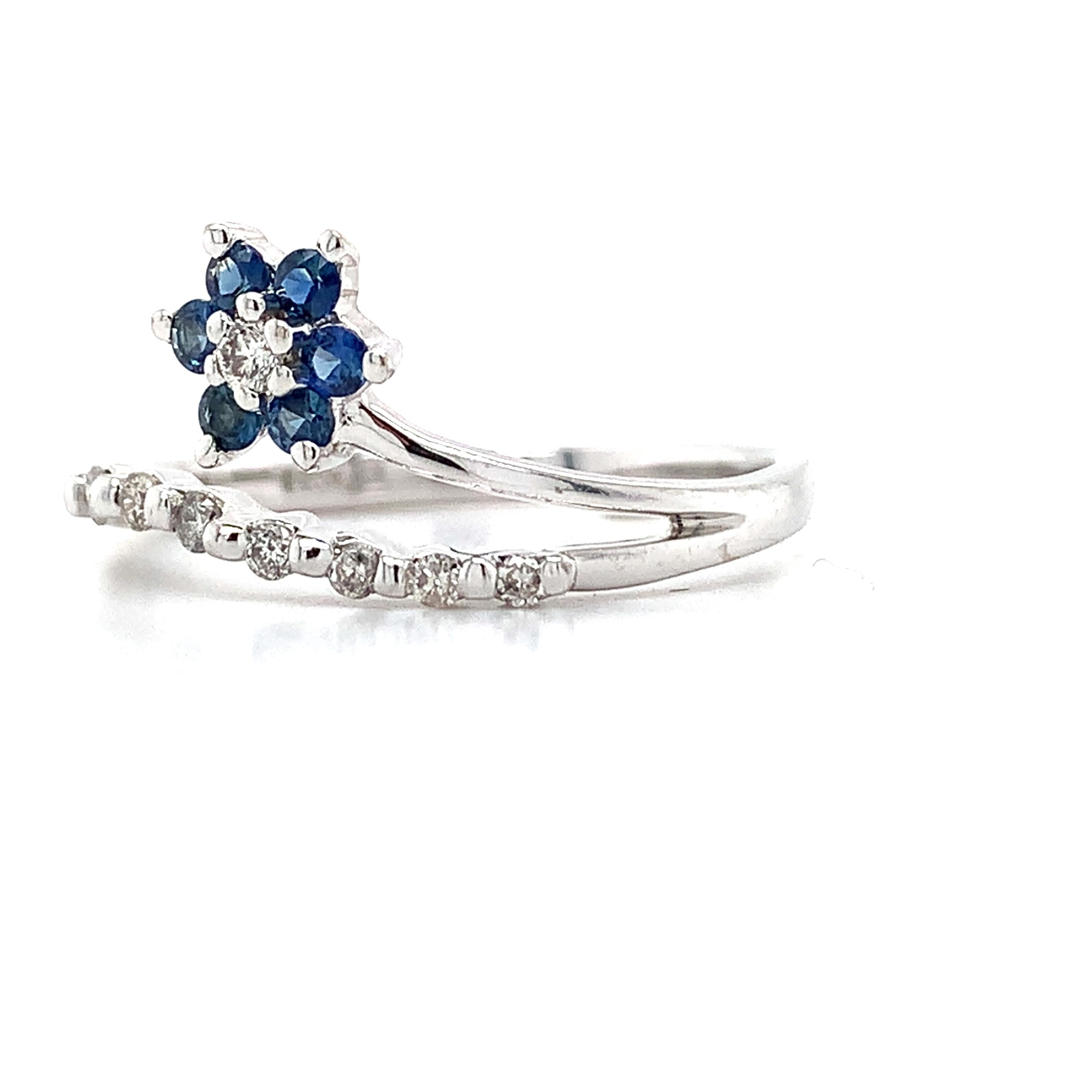 14K White Gold Blue Sapphire And .1ct Round Diamond Split Shank Flower Band Ring