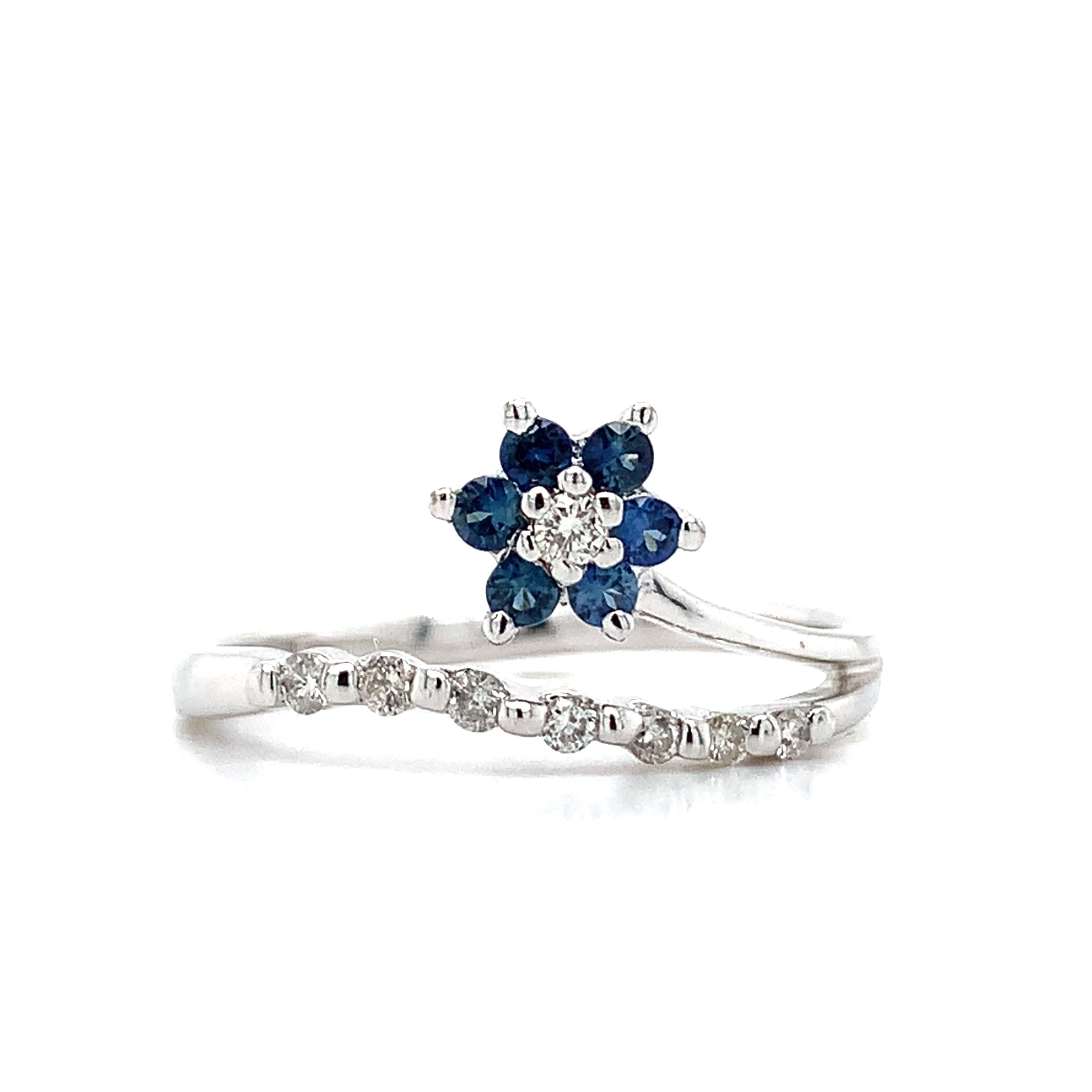 14K White Gold Blue Sapphire And .1ct Round Diamond Split Shank Flower Band Ring