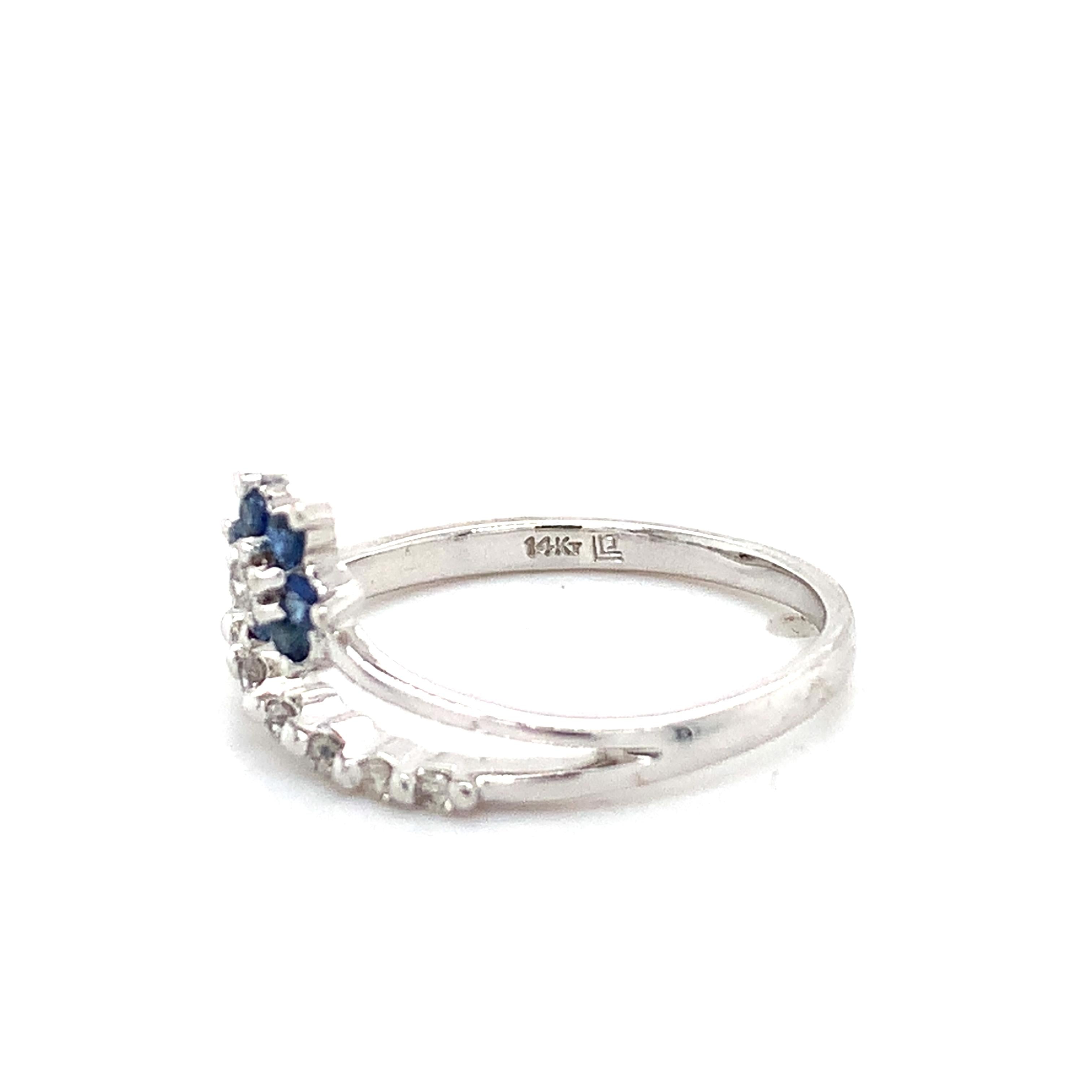 14K White Gold Blue Sapphire And .1ct Round Diamond Split Shank Flower Band Ring