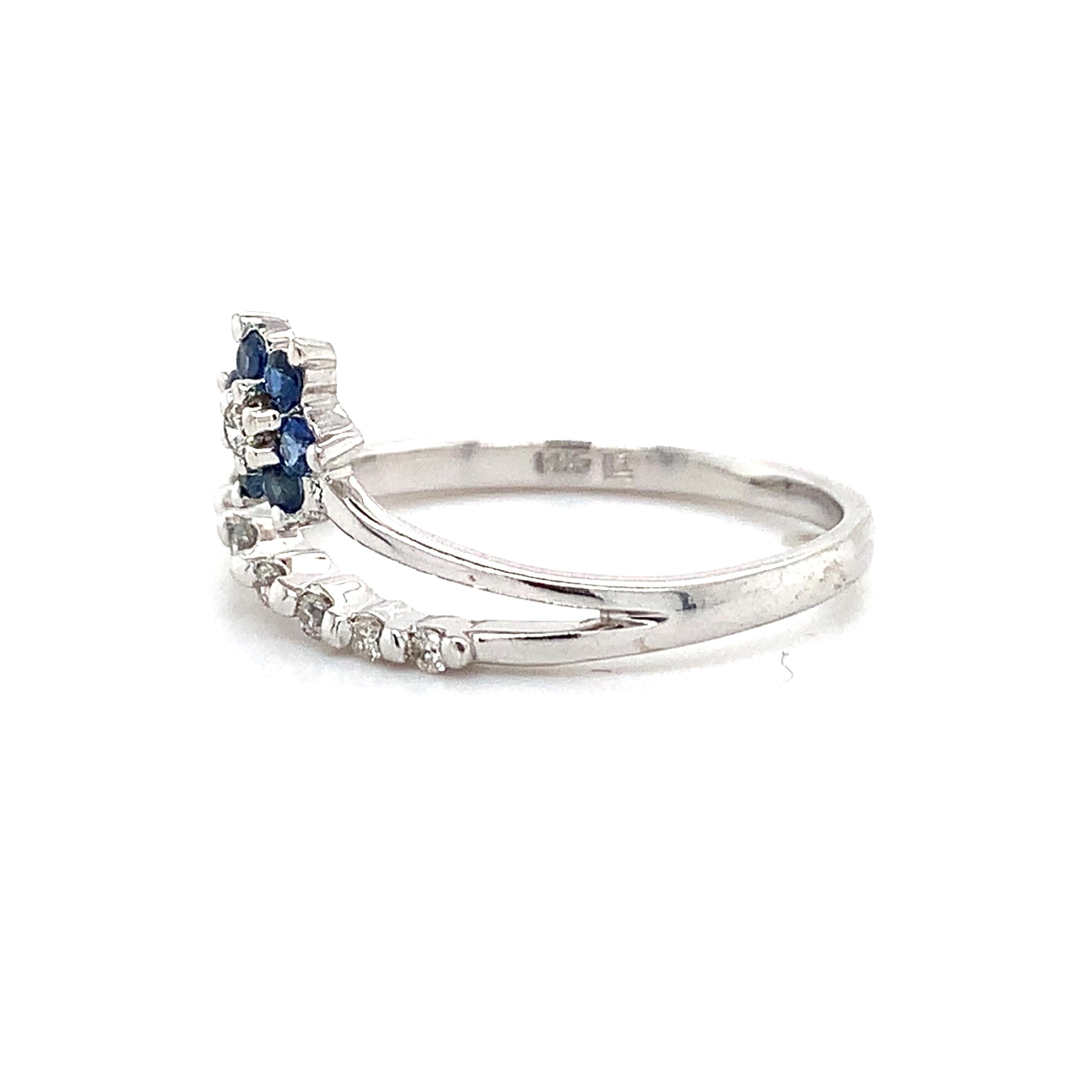14K White Gold Blue Sapphire And .1ct Round Diamond Split Shank Flower Band Ring