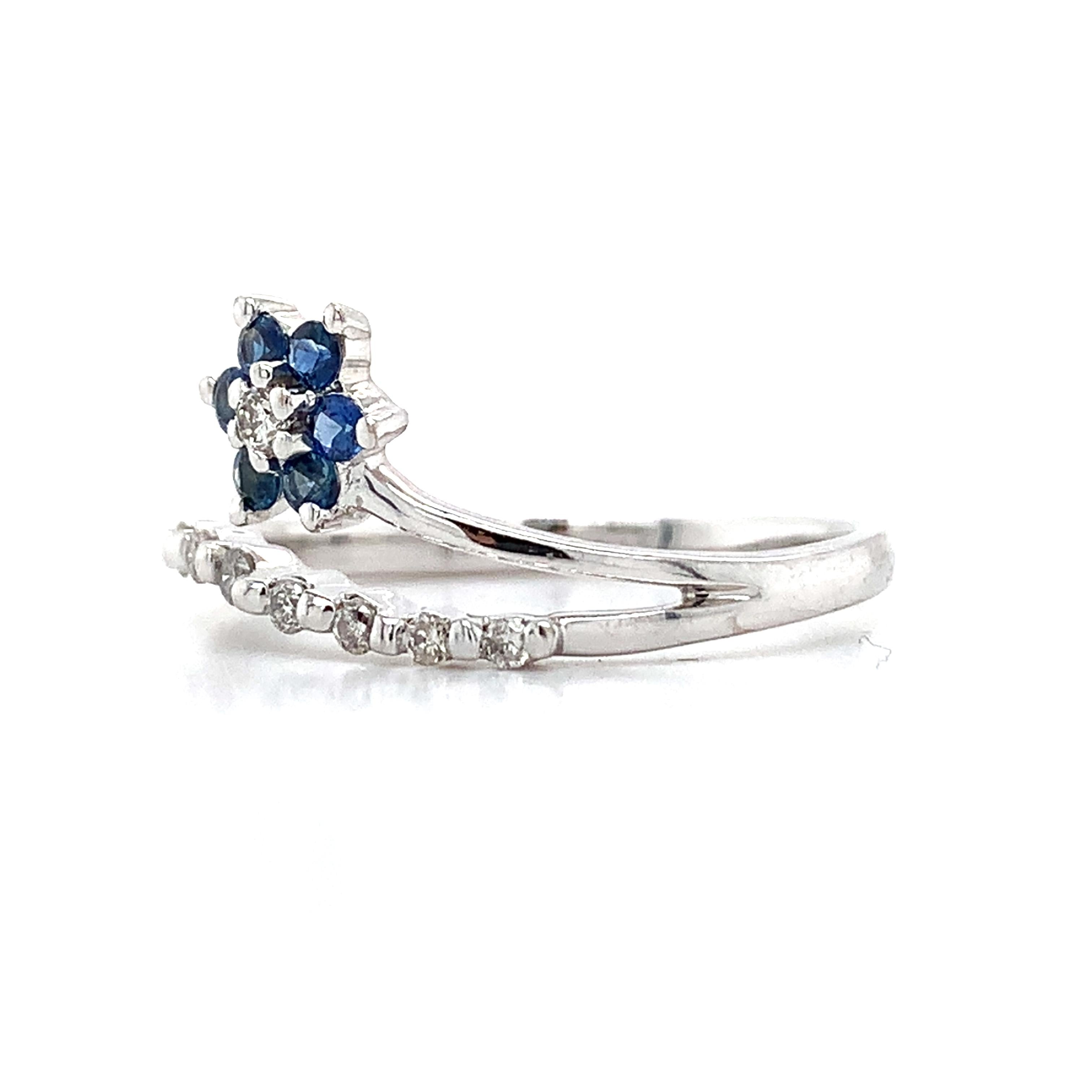 14K White Gold Blue Sapphire And .1ct Round Diamond Split Shank Flower Band Ring