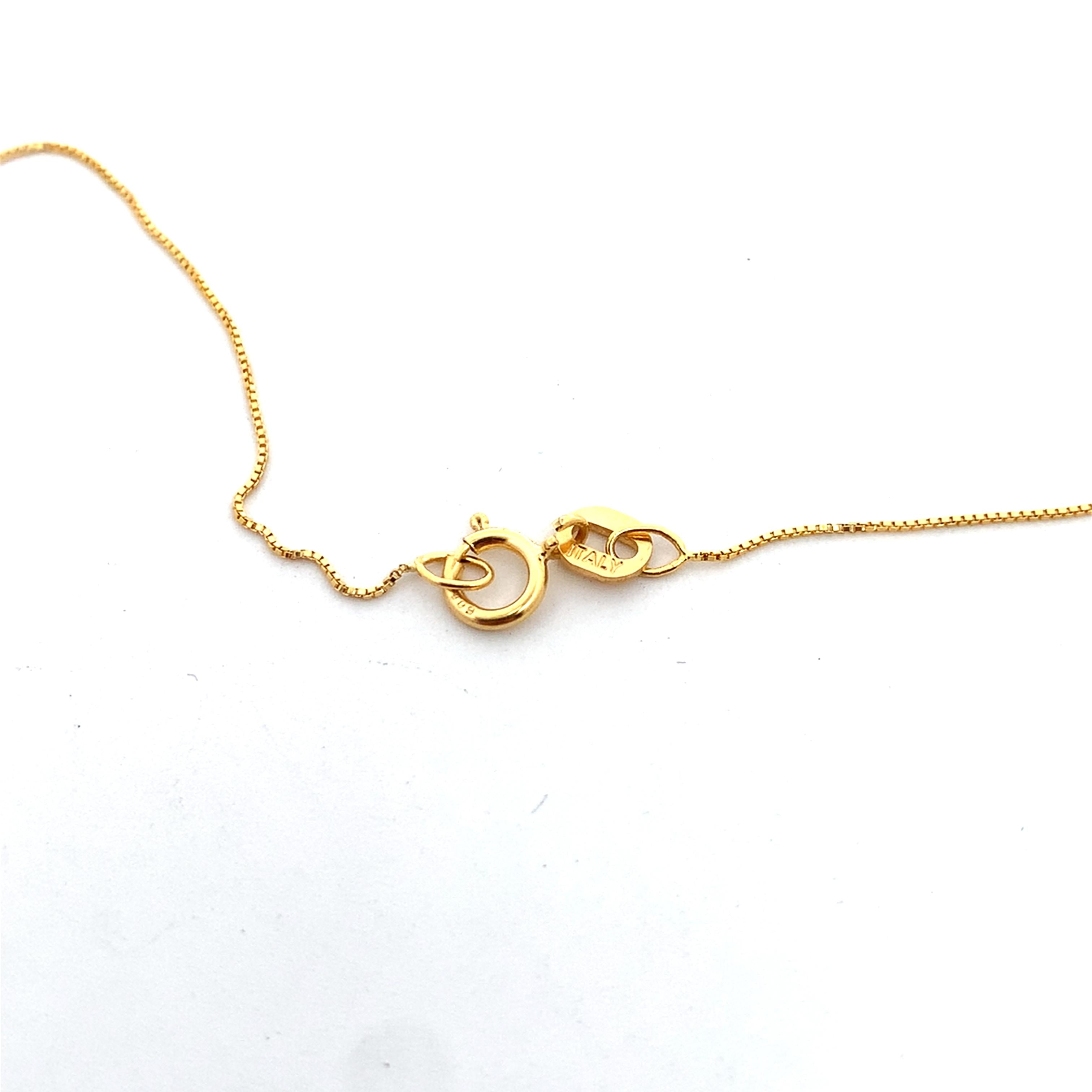 14k Yellow Gold Oval Ruby Center Ruby And Diamond Pendant With Chain