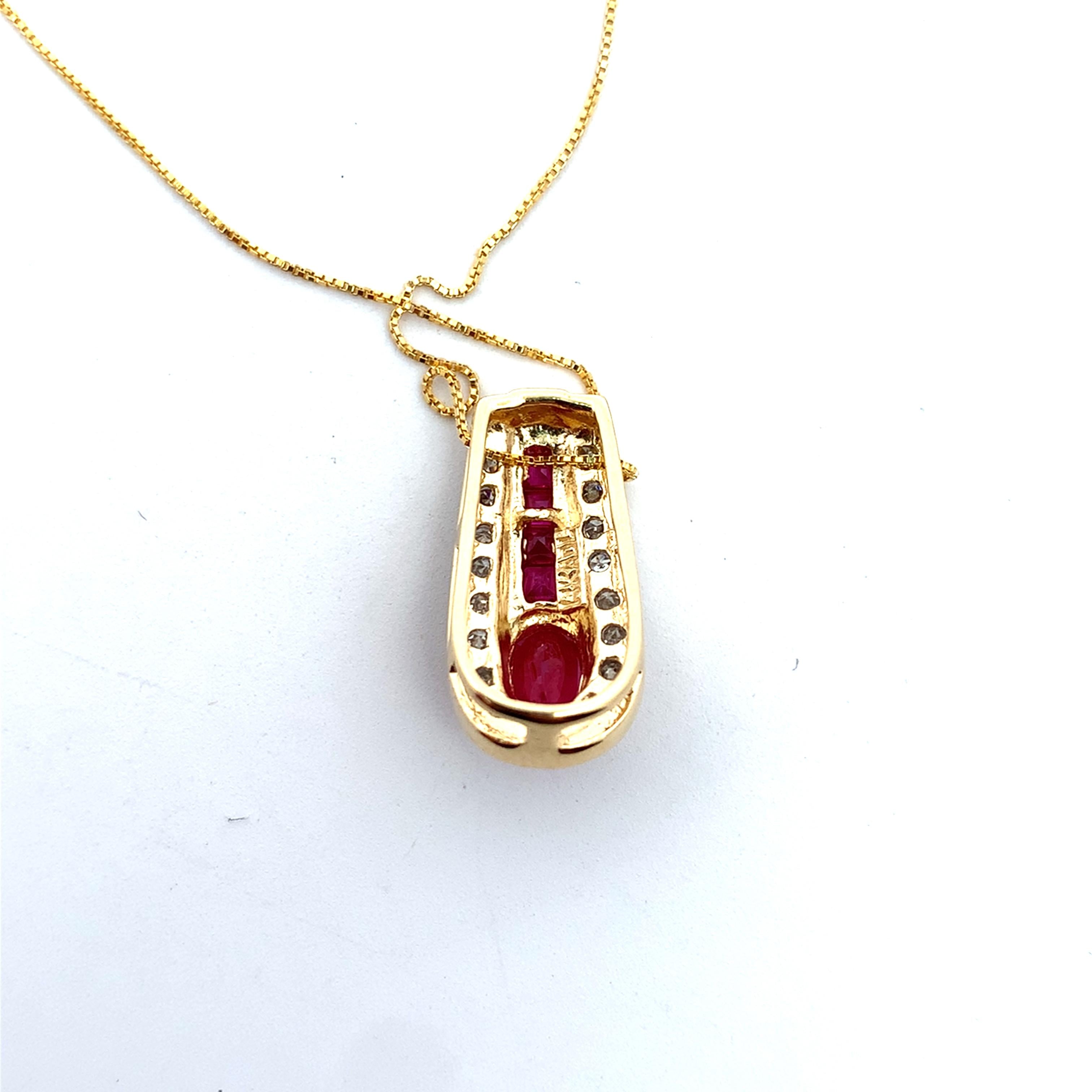 14k Yellow Gold Oval Ruby Center Ruby And Diamond Pendant With Chain