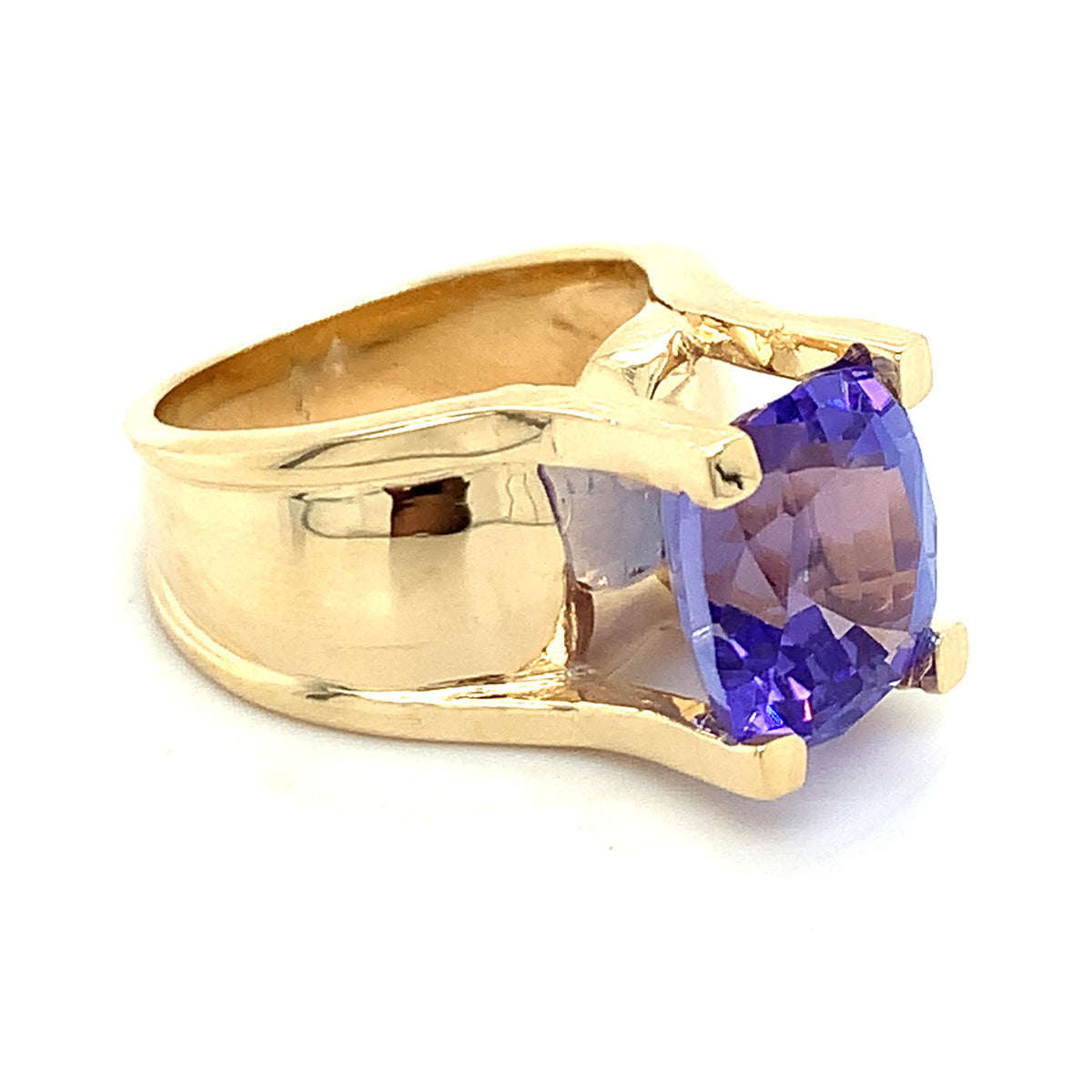 14K Gold Cushion Cut Tanzanite Flat-Tab Prongs Curved Wide Shanks Solitaire Ring